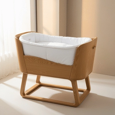 Modern bassinet in a bright nursery